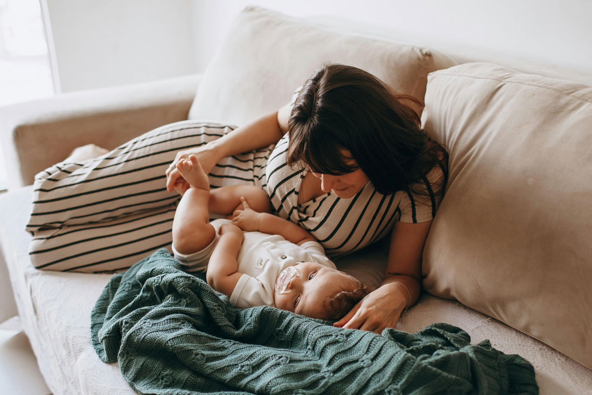 Mom and baby on a sofa